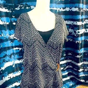 Flattering Black And Gold Blouse With Gold Buckle.